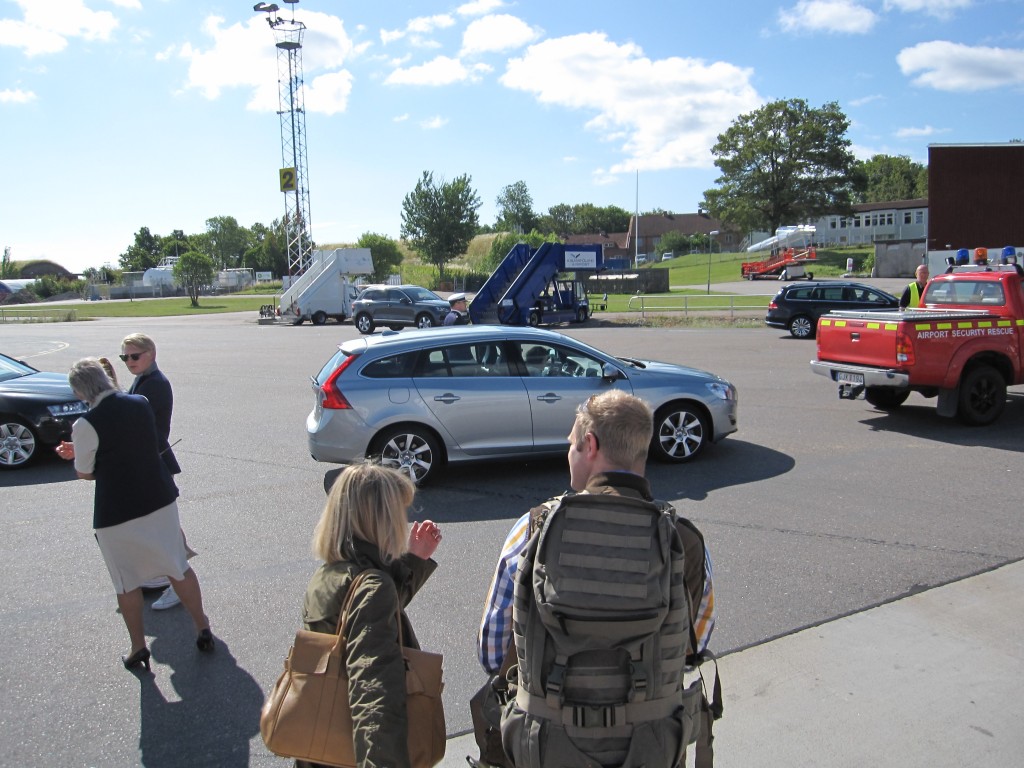King Carl XVI Gustaf in their Volvo wagon