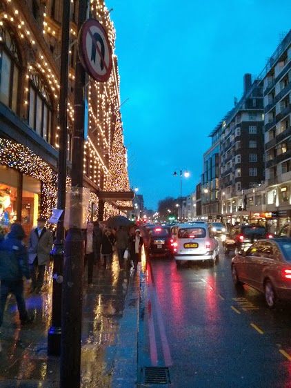 Harrod's was still looking festive despite the storm, and it provided  welcome point of shelter for many - and you could pass the time by shopping or eating.