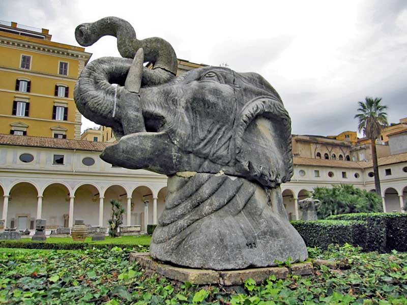 This elephant head is one of the animal head sculptures that is placed around the fountain in the courtyard.