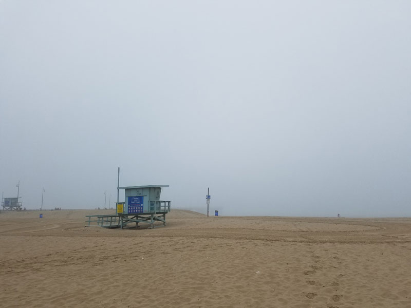 Looking out over the beach with the fogged in Venice Pier in the background.
