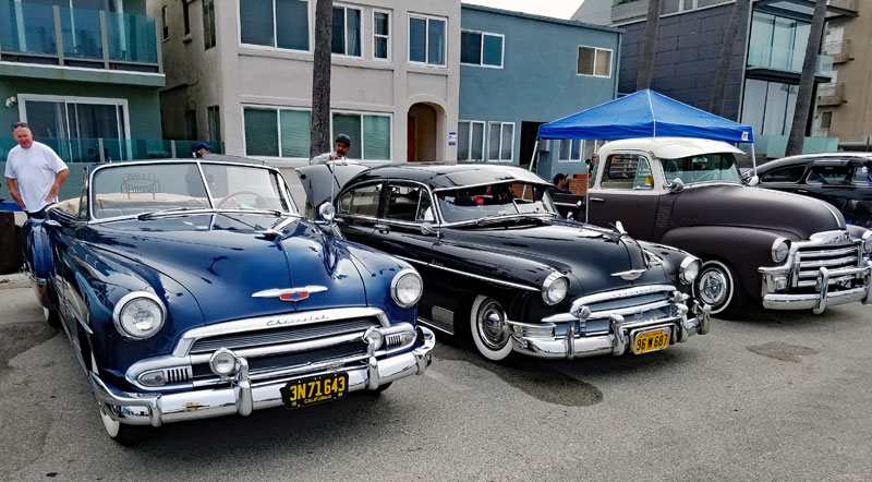 Three very cool rides lined up in the lot