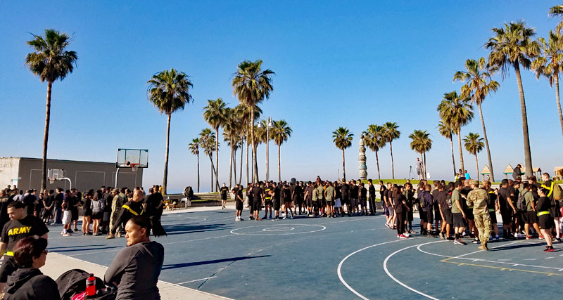 Army personnel at the basketball courts off the Venice Boardwalk this morning