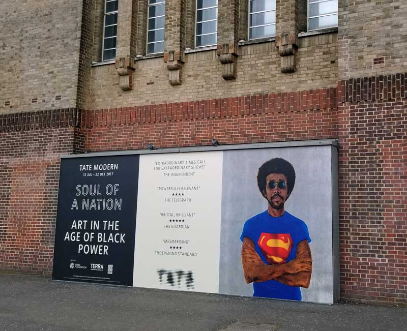 Soul of a Nation poster at Tate modern with Barkley L. Hendricks, Icon For My Man Superman (Superman Never Saved Any Black People--Bobby Seale), 1969. Collection of Liz and Eric Lefofsky.