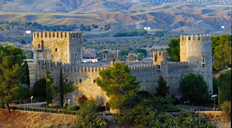 Castillo de San Servando is a Medieval castle just outside the city of Toledo that is now a hostel.