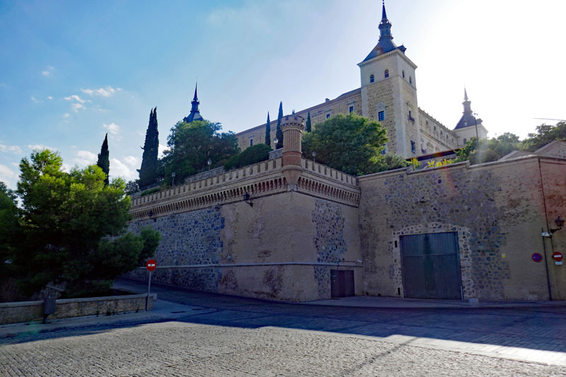A view of the imposing Alcázar de Toledo on top of the hill.