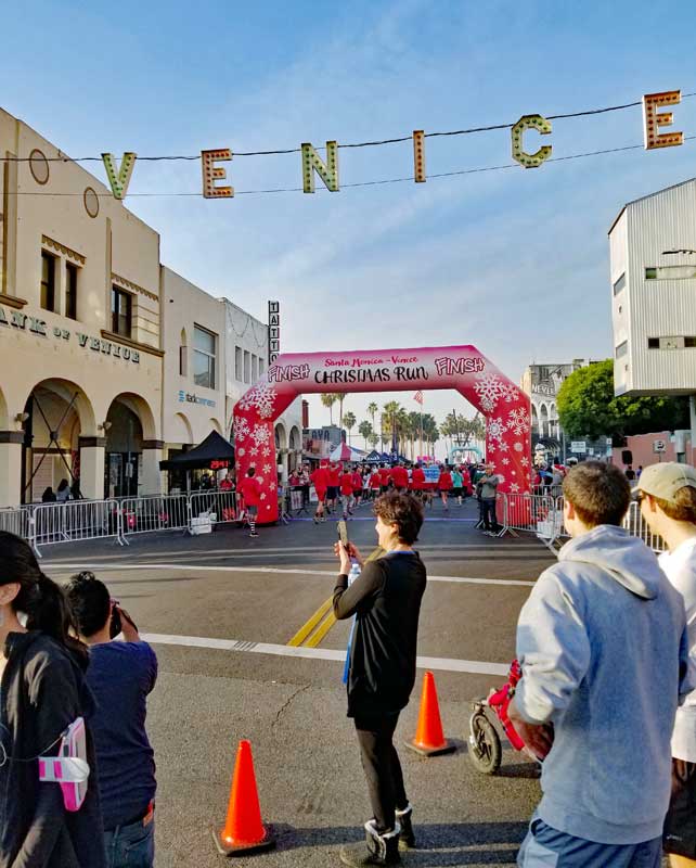 Finish Line under the Venice sign at Windward and Pacific Avenues.