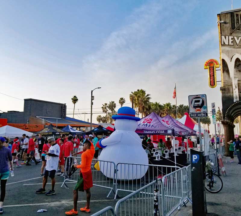 A Snowman helps create a Christmas atmosphere at the finish line area.
