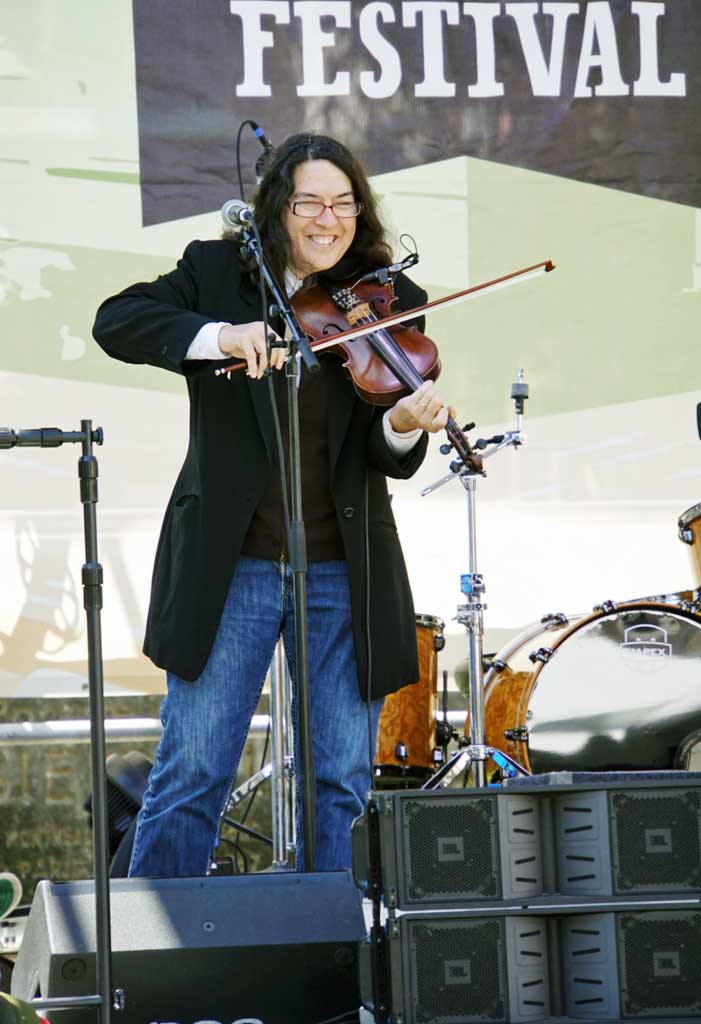 A fiddler on one of the many stages during the 2018 French Quarter Fest.