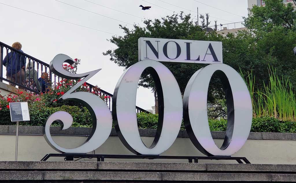 New Orleans 300 sign by Jackson Square.