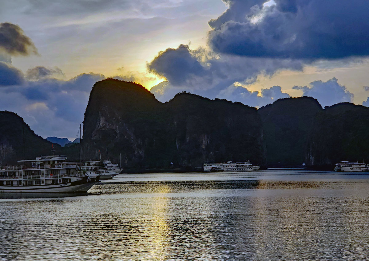 Daylight is starting to light up Ha Long Bay.