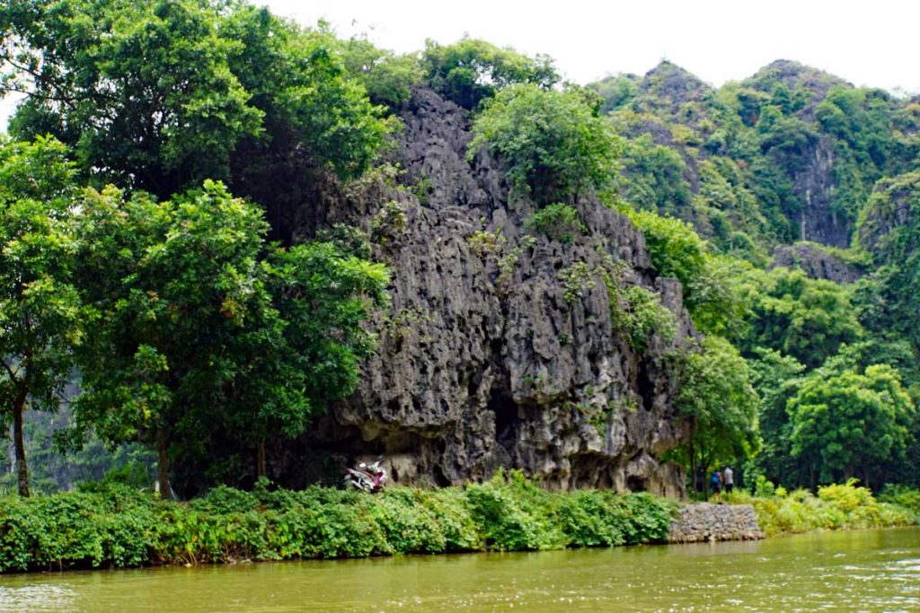 Limestone formations line the river.