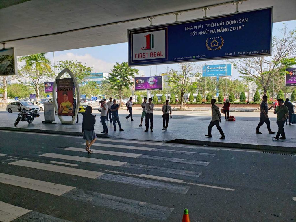 Da Nang International Airport (DND) Arrival, with the usual scam artists and taxi customer wranglers.