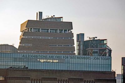 Tate Modern seen from the Milennium bridge with the new Switch House in the background.